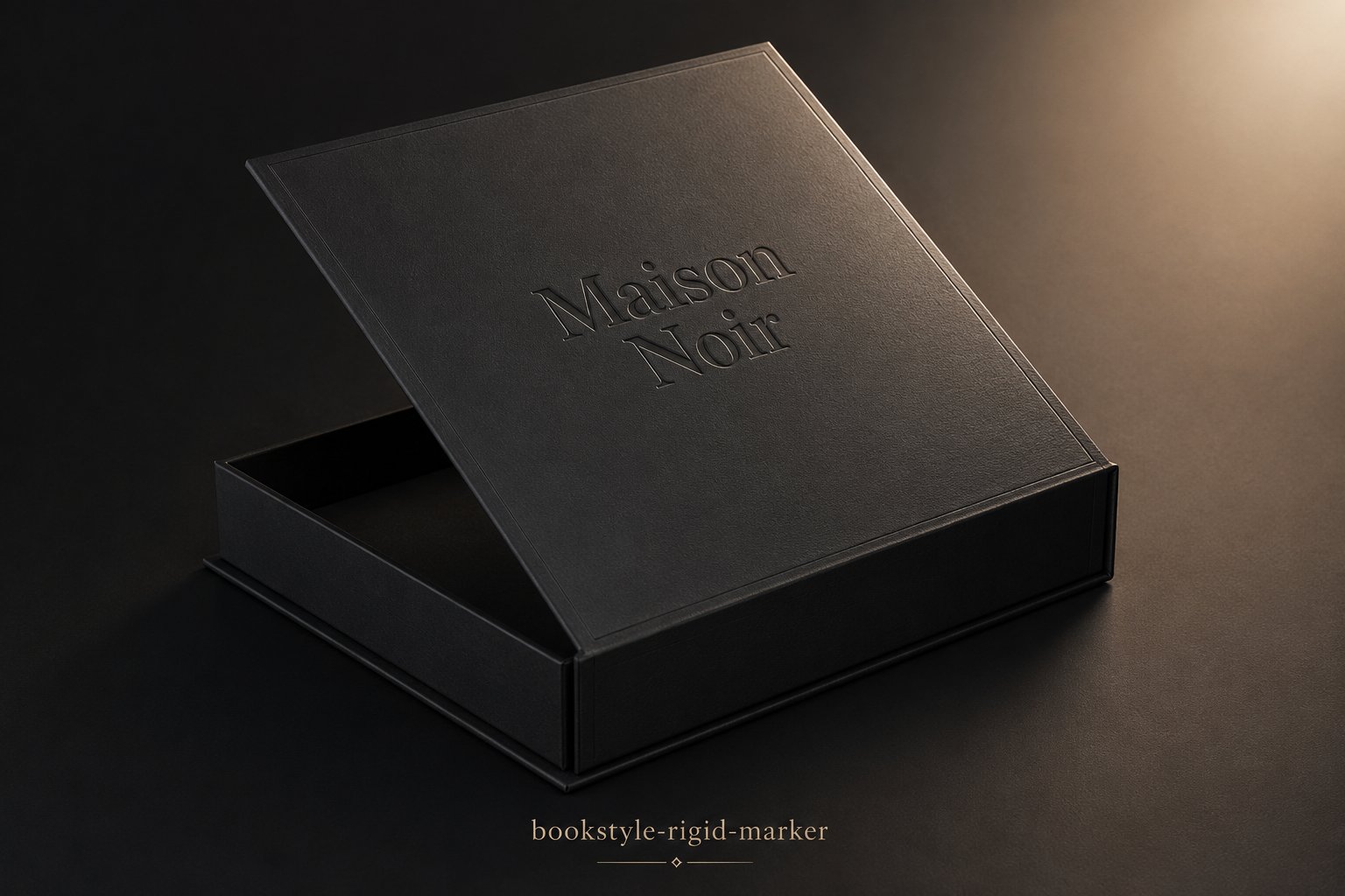 Book-style rigid box that opens like a hardcover to reveal a product in a fitted well